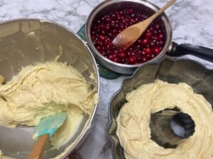 Alternate Batter and Cranberry Sauce in the Cake Pan