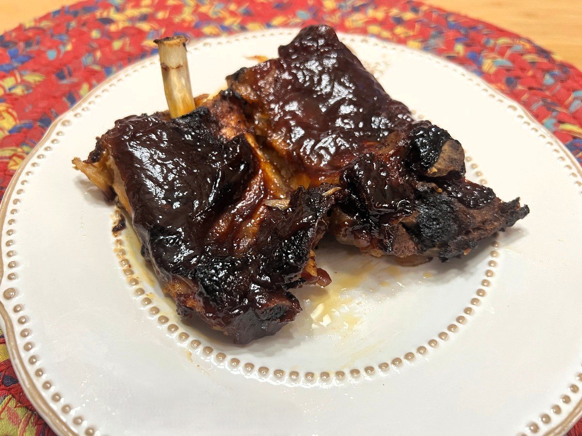 Serving BBQ Baby Back Ribs on Pfaltzgraff Farmhouse Hen Plates