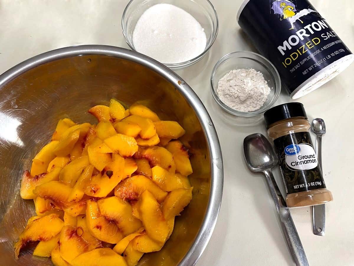Add Sugar, Flour and Spices to the Sliced Peaches