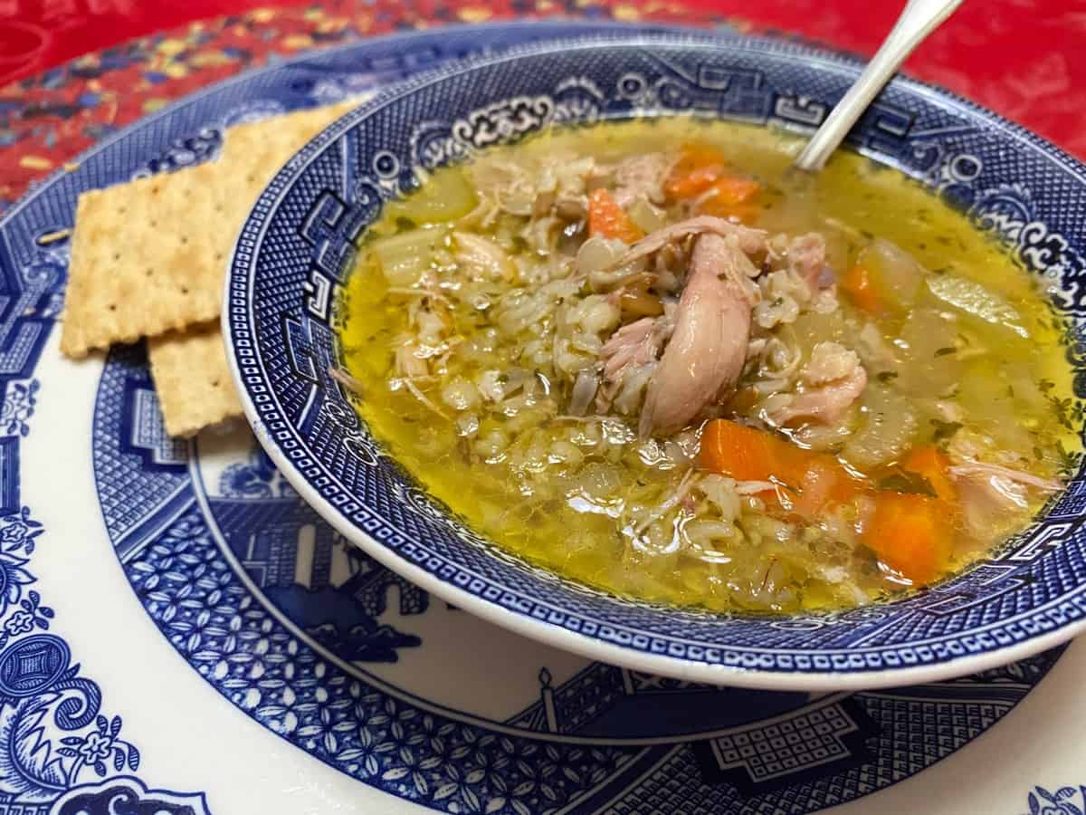 Serve Chicken Soup with Wild Rice with Saltine Crackers