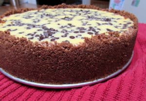 Chocolate Chip Cheesecake with crust to top of pan