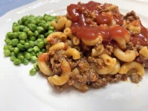 Goulash with Ketchup and a side of Green Peas