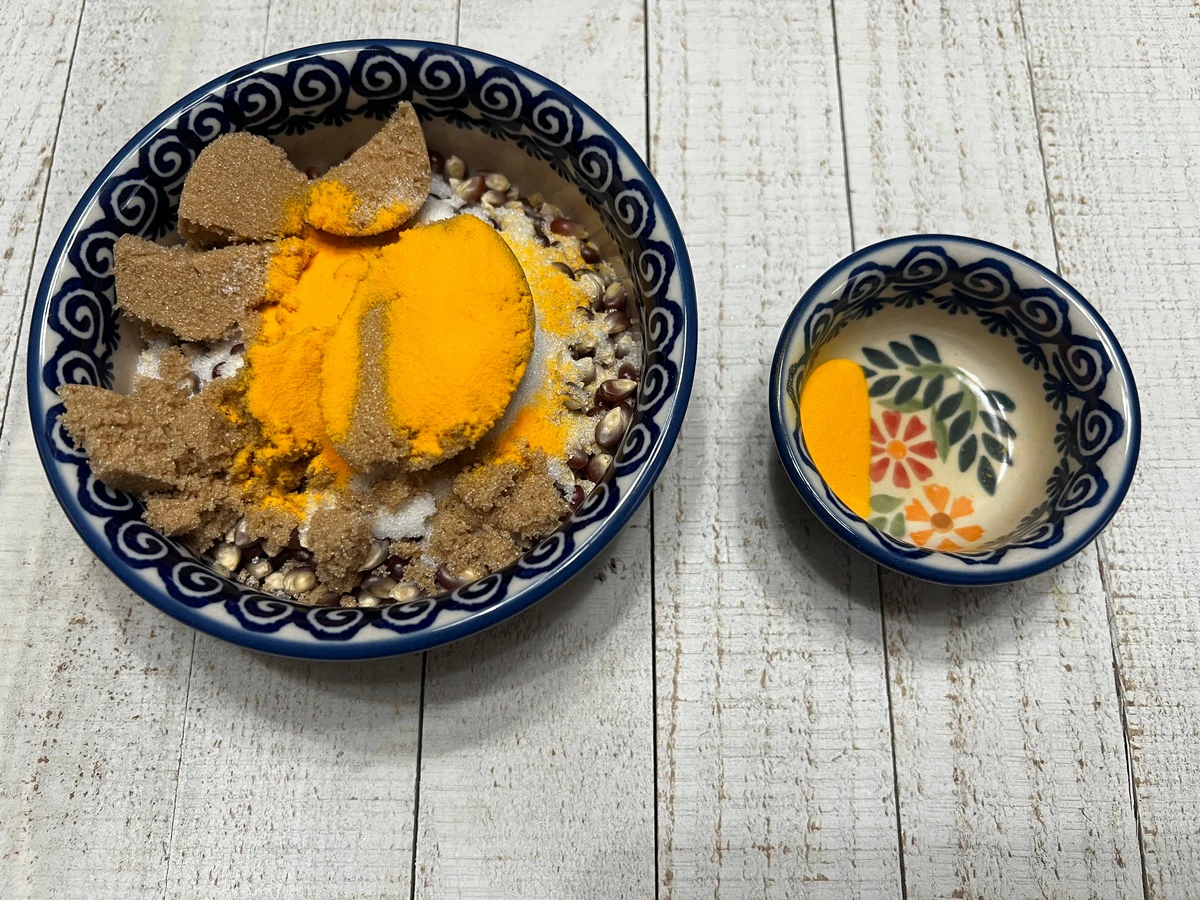 Mix Sugar, Buttered Salt, and Popcorn in Small Bowl