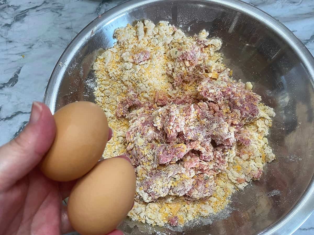 Add Eggs and Sausage to Mixture