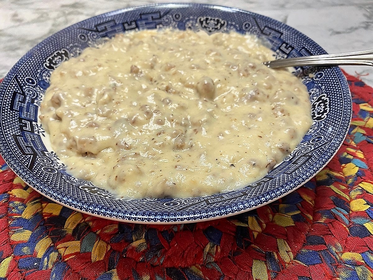 Serving Sausage Gravy in a Blue Willow Serving Bowl
