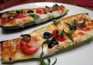 Baked Italian Zucchini Boats with Cherry Tomatoes and Basil
