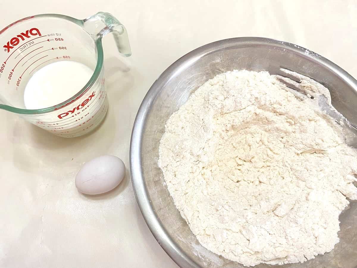 Add Milk and Egg to the Flour Ingredients