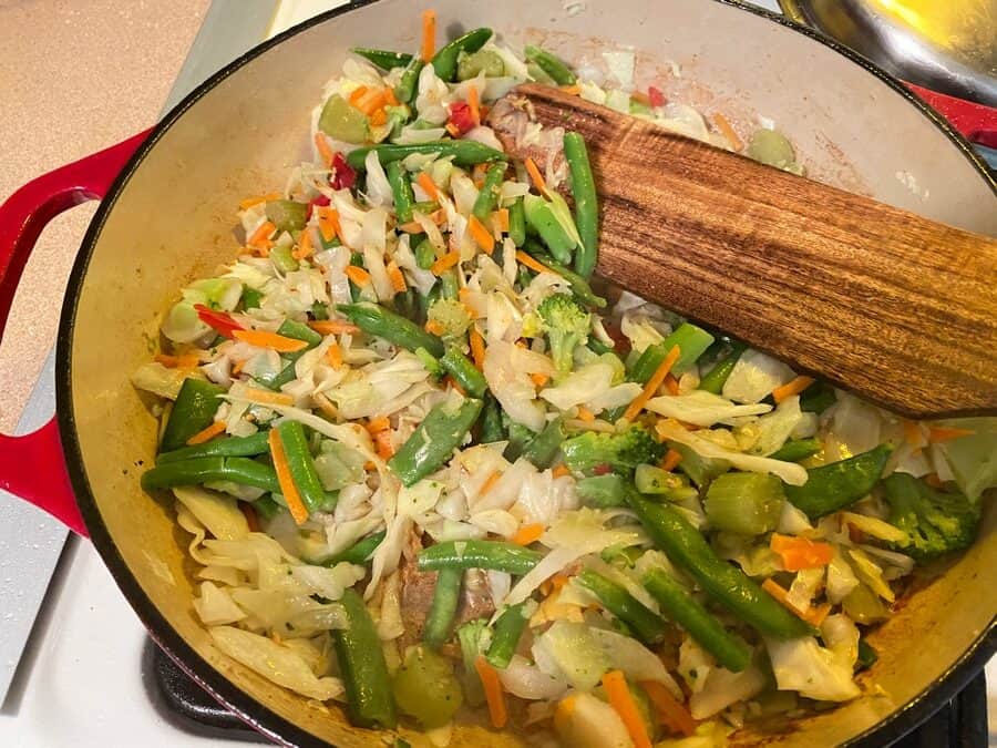 Adding Stir-Fry Vegetables to the Dish