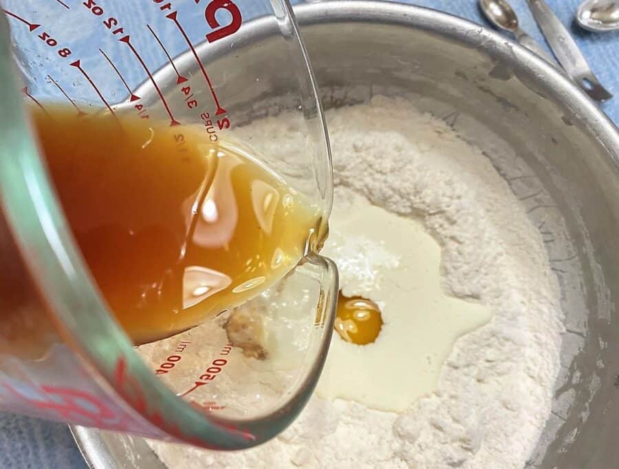 Adding Fresh Apple Cider to the Dough
