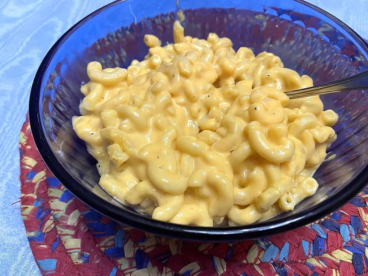 Serving Creamy Macaroni and Cheese