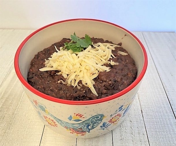 Refried Black Beans with Monterey Jack Cheese for Garnish