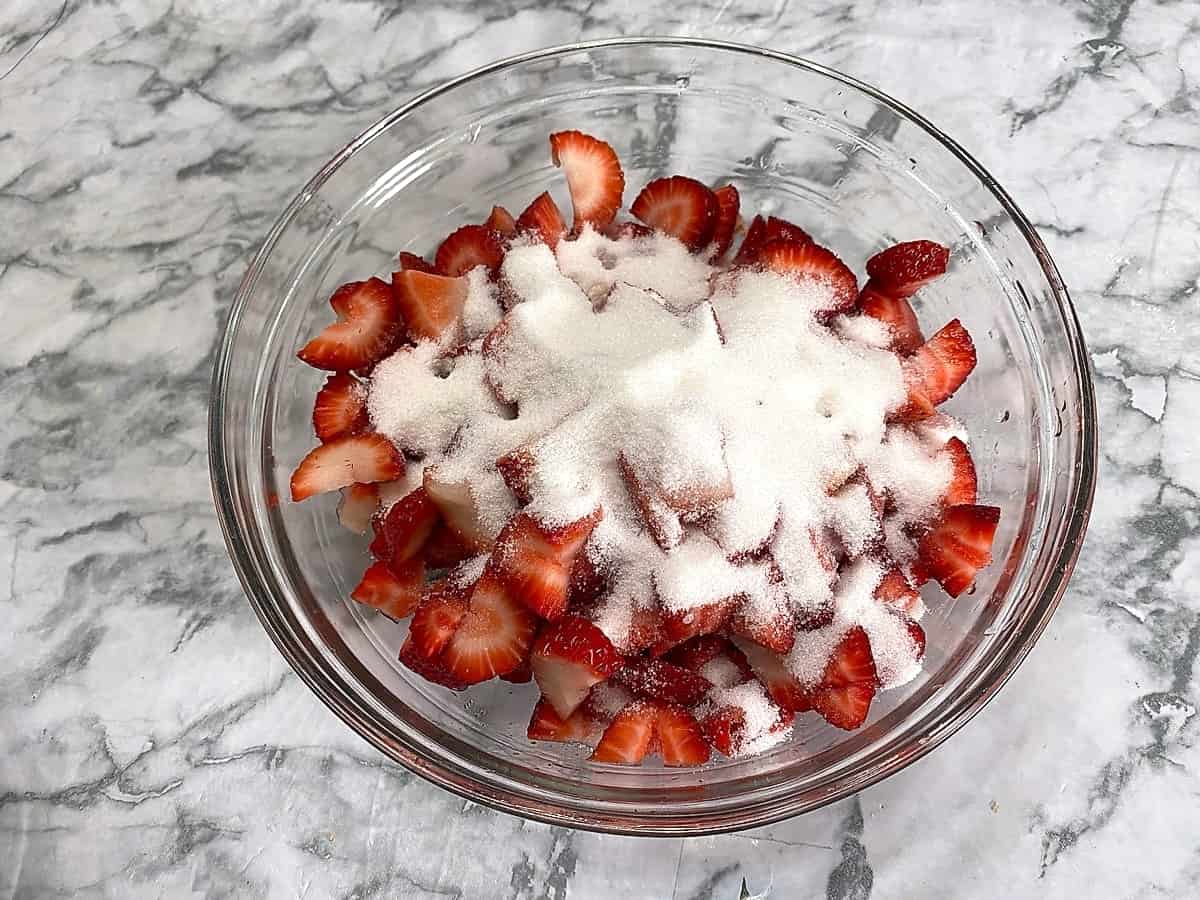 Add Sugar to the Sliced Strawberries