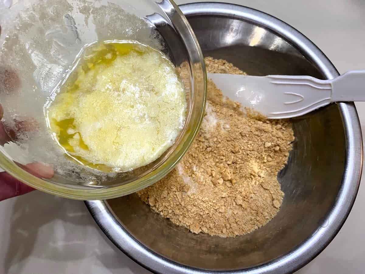 Add Melted Butter to the Crushed Crackers and Granulated Sugar