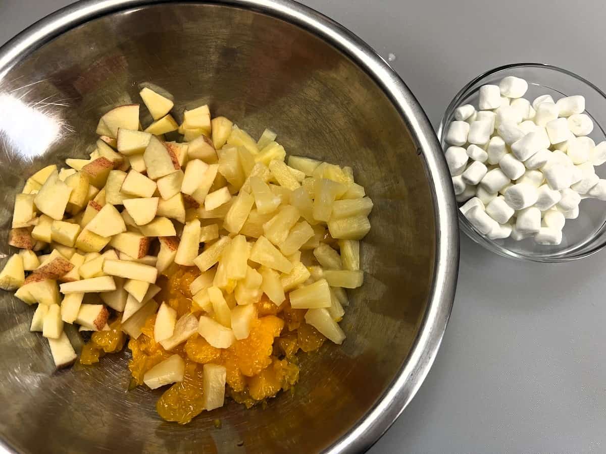 Combine the Fruit in a Large Mixing Bowl