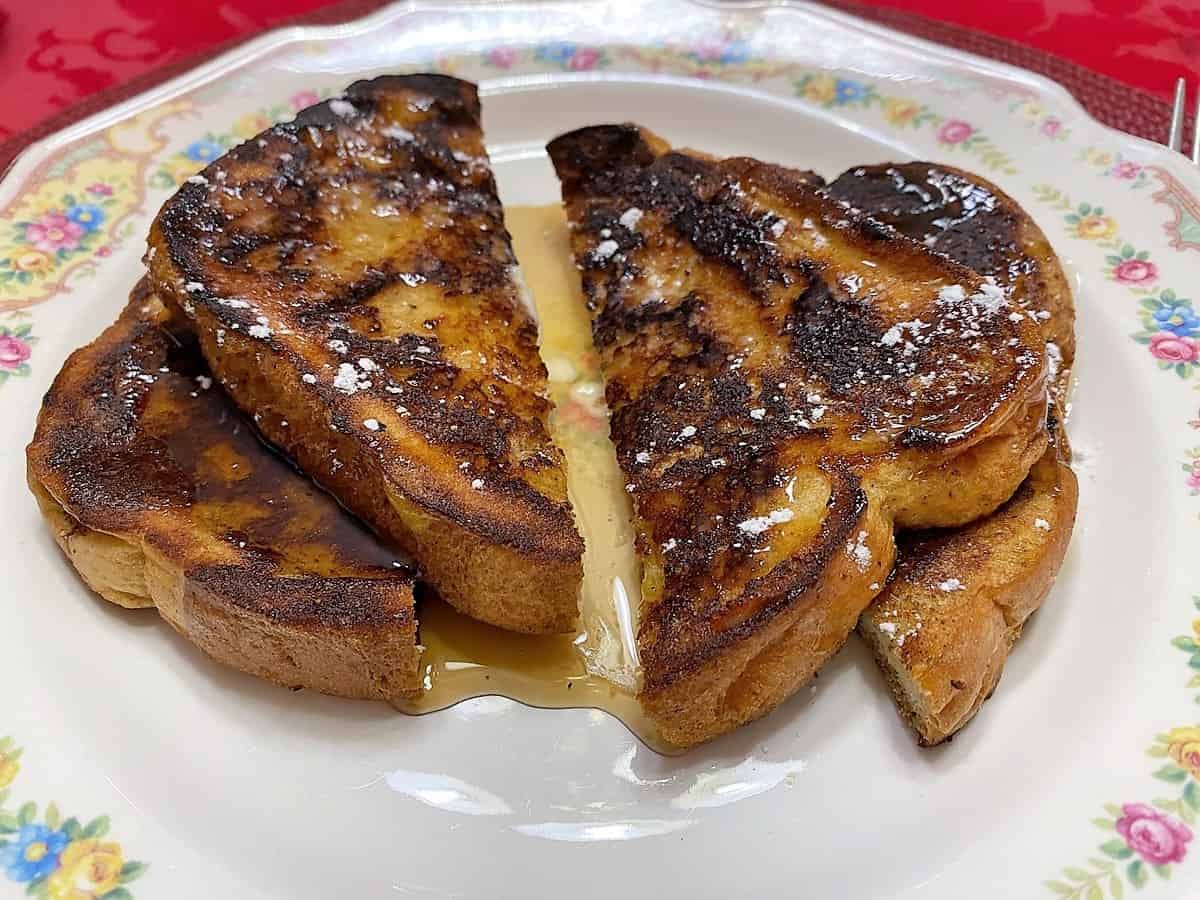 Serving French Toast Sliced with Powdered Sugar - Served on Mildred Plates by Mt. Clemens Pottery