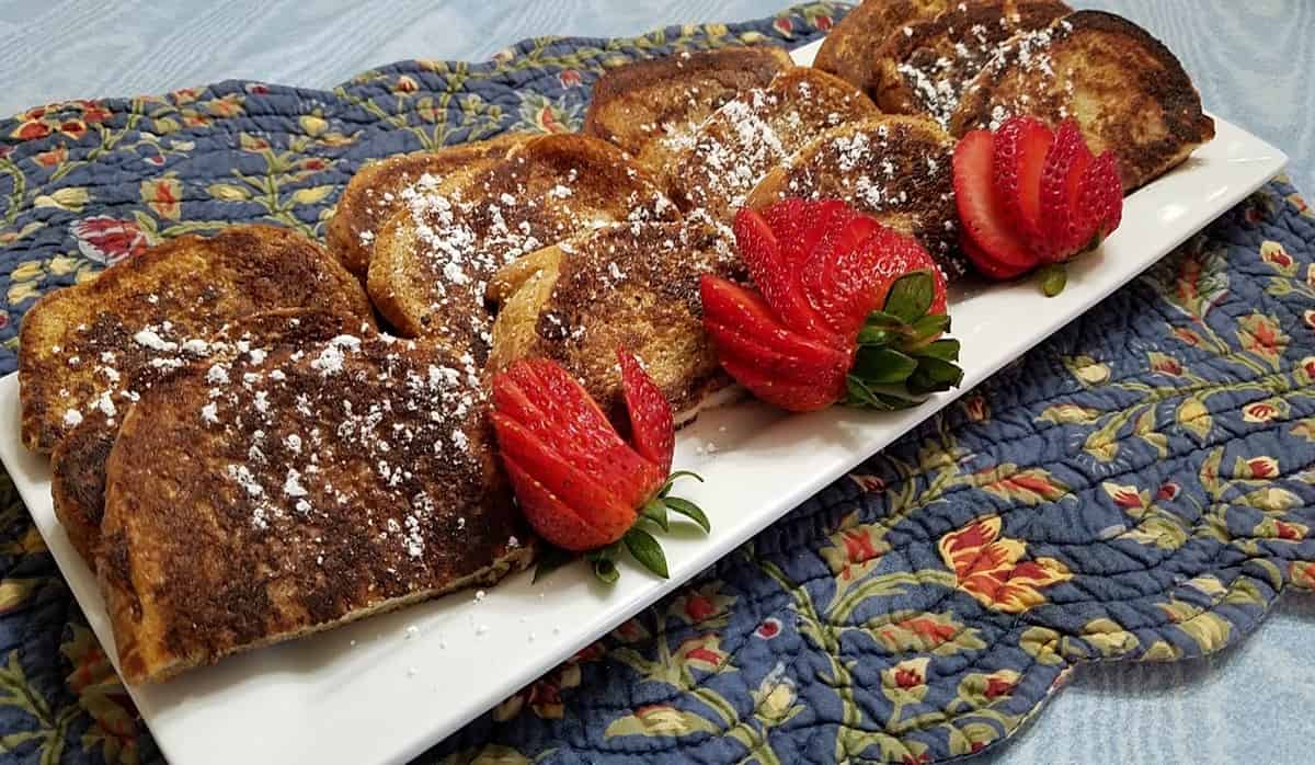 Serving French Toast on Long White Platter with French Strawberries