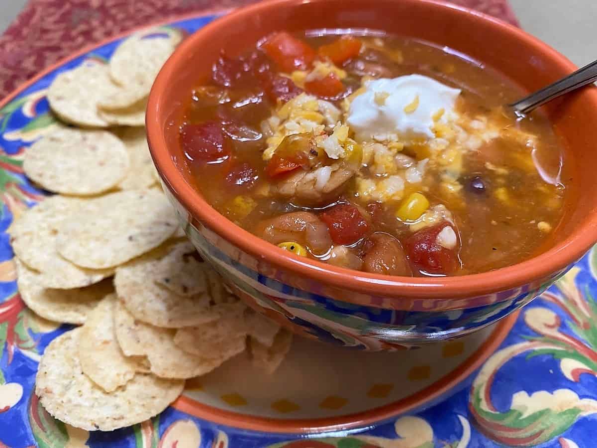 Serve Soup with Corn Tortillas, Cheddar Cheese and Sour Cream