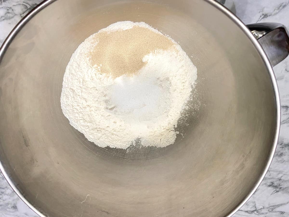 Mix Yeast, Sugar, and Salt with Flour to Make Dough