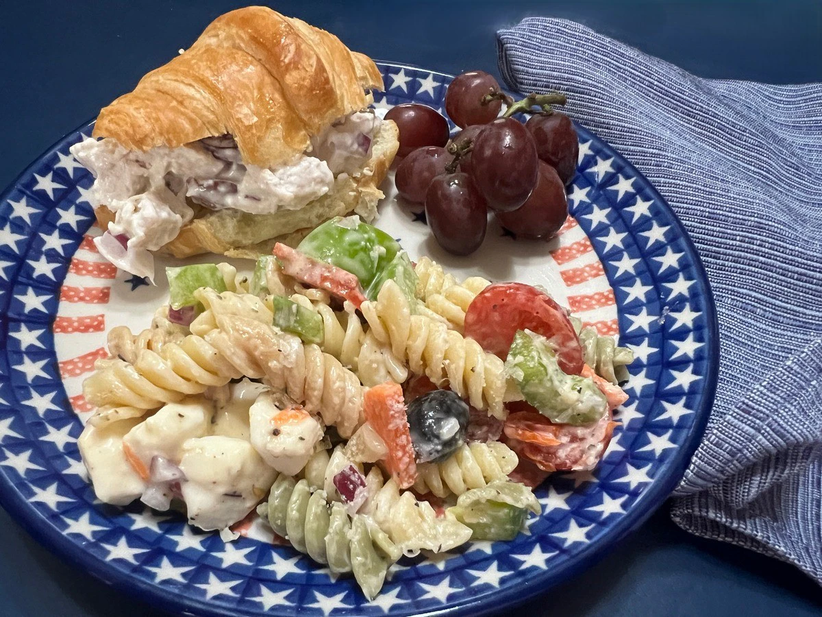 Serving Antipasto Rotini Salad on Polish Pottery Plates - Americana Pattern