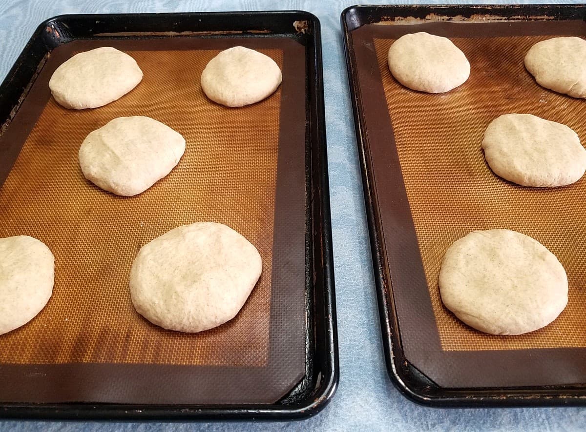 Flatten Balls of Dough into Bun Shapes