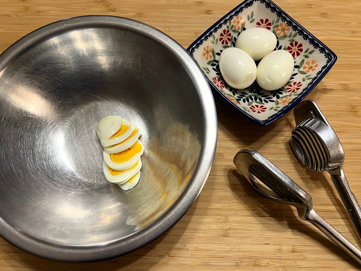 Slice Boiled Eggs with Knife of Egg Slicer