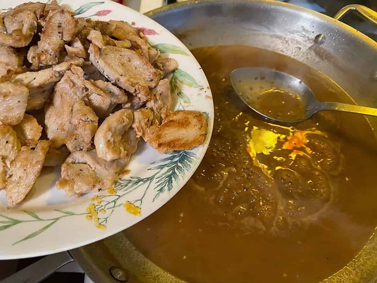 Add Chicken to Sauce and Continue Cooking until Sauce Clings to Chicken
