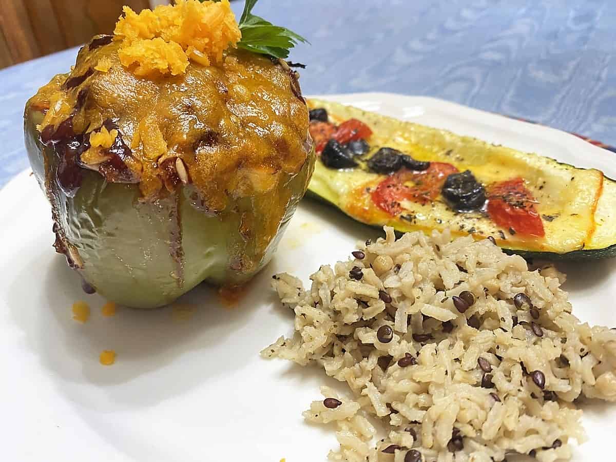 Served Herbed Brown Rice with Stuffed Bell Peppers