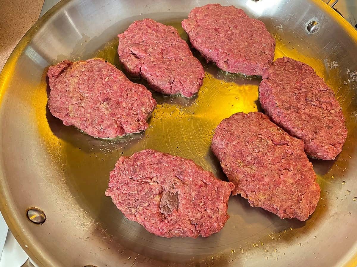 Brown the Steak Patties in a Large Skillet with Oil