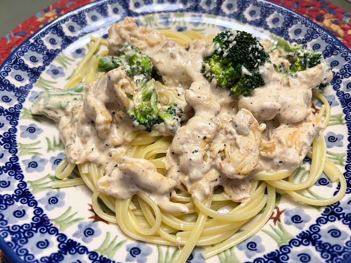 Creamy Chicken Fettuccine Alfredo Served on Polish Pottery Plates - Rise and Shine Pattern