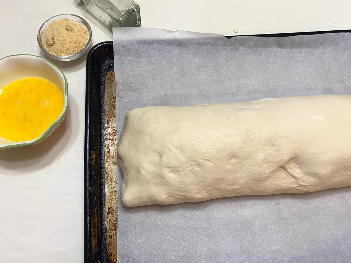 Pinch Ends of Dough Together and Turn Onto Parchment Paper