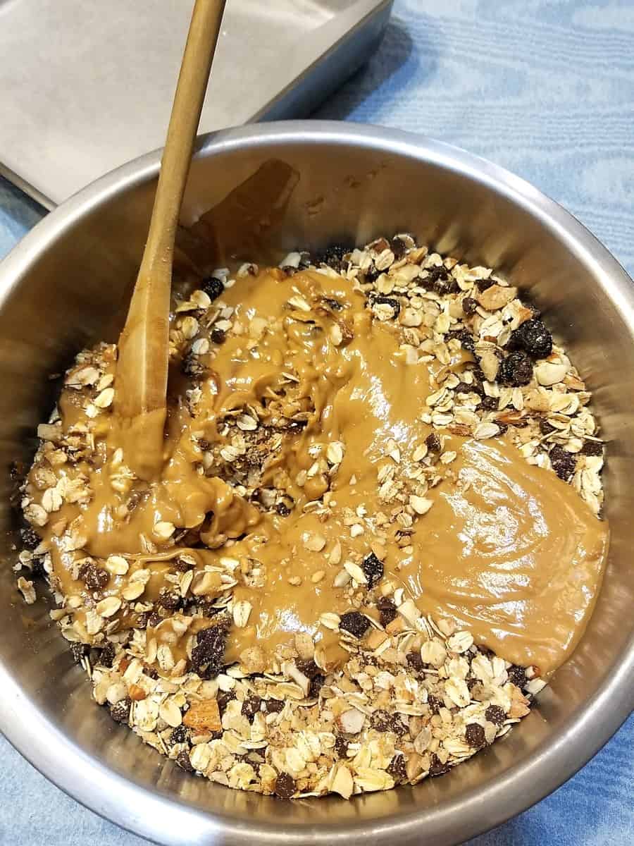 Mixing Peanut Butter Mixture into the Granola