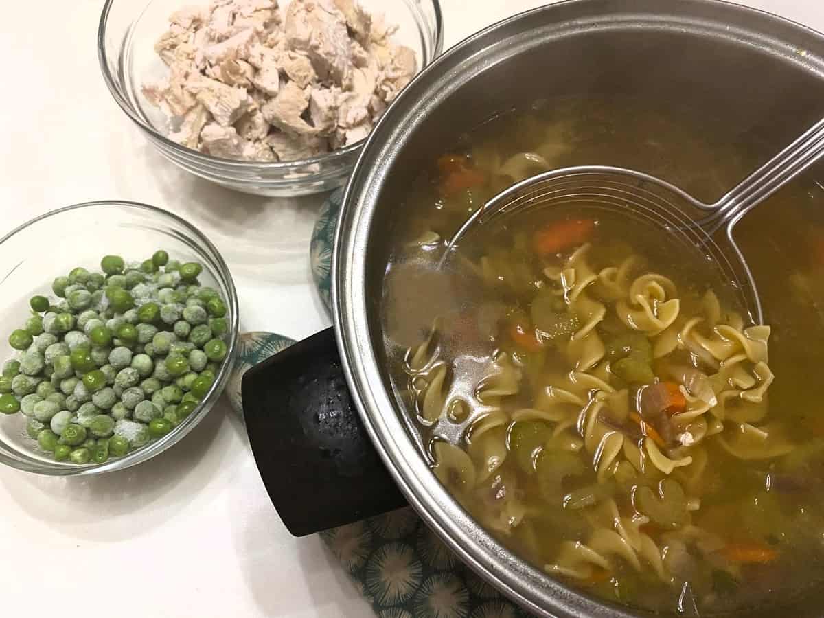 Add Noodles and Peas to Boiling Broth 