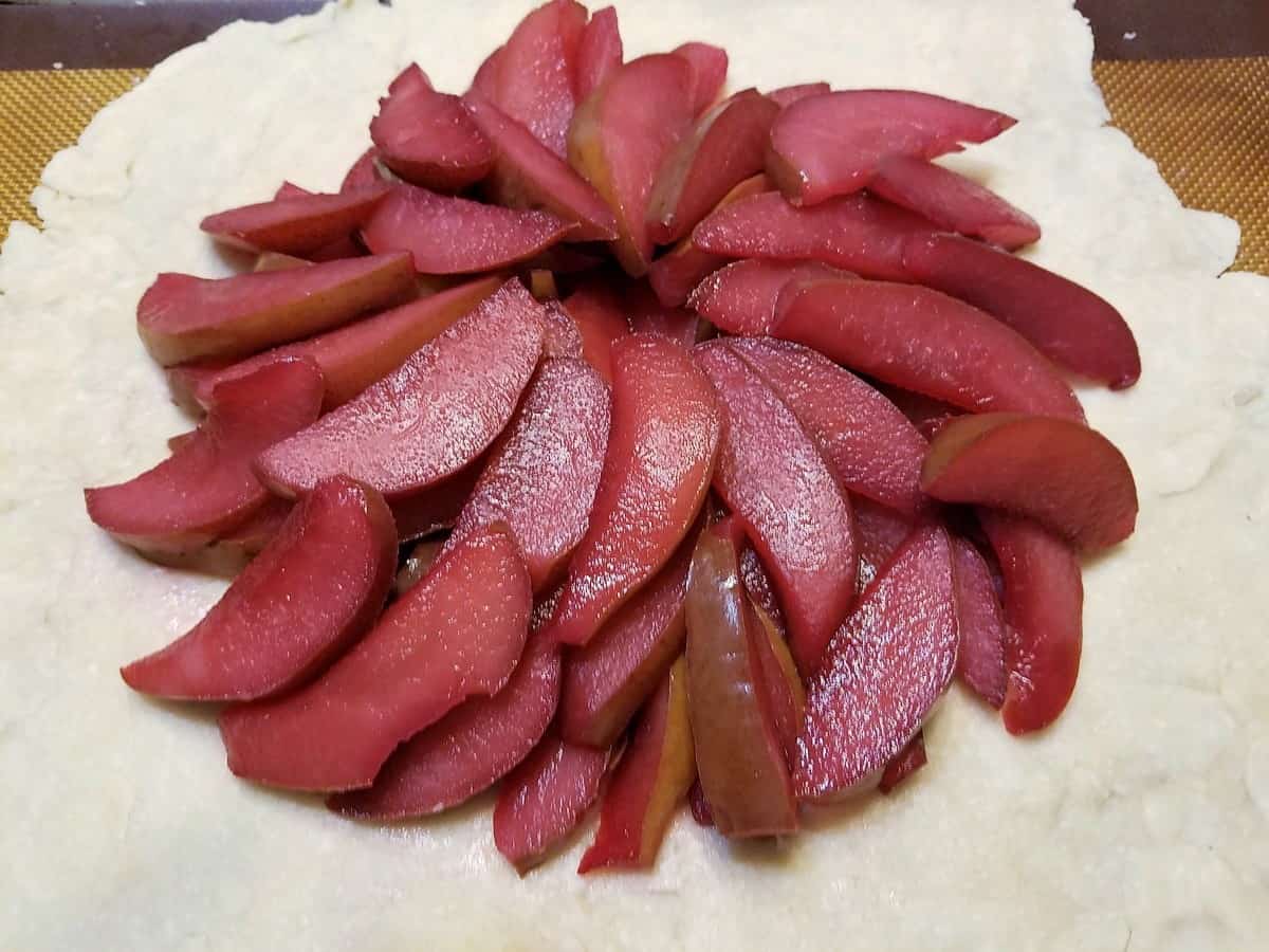 Arrange the Poached Pears in the Center of the Pie Dough