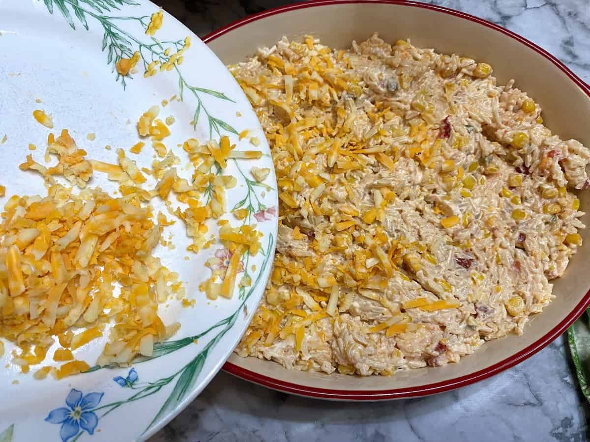 Top Rice Mixture with Grated Cheese