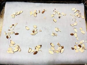Group Almond Slices onto Baking Sheet