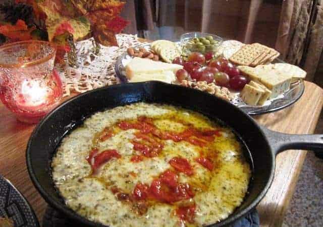 Serve Baked Gruyere Cheese Dip with Toasted Bread, Crackers, Sliced Apples or Pears