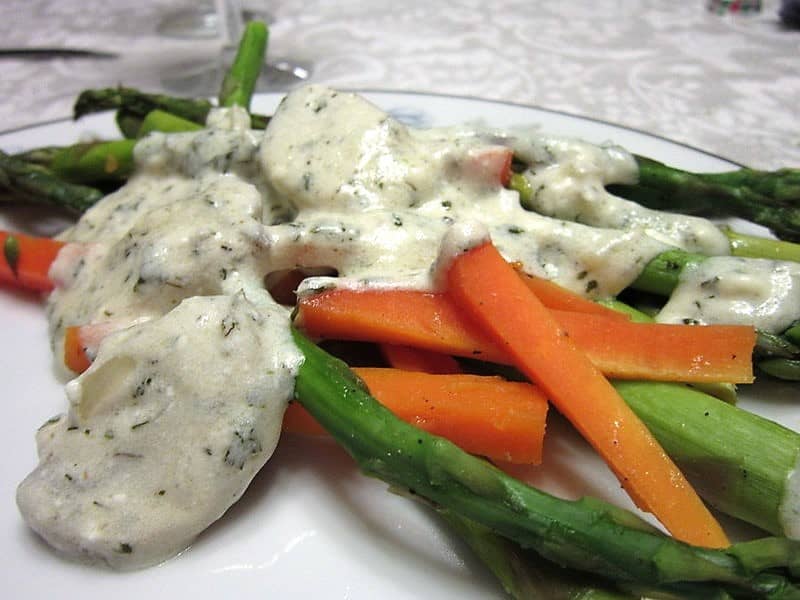 Cream Sauce Served over Asparagus and Carrots
