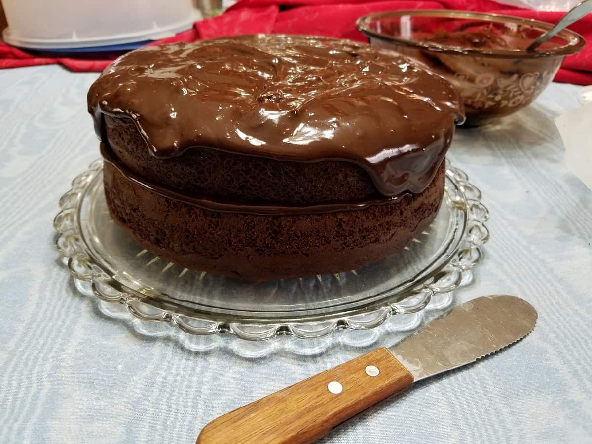 Spoon Ganache Icing between Layers and on Top