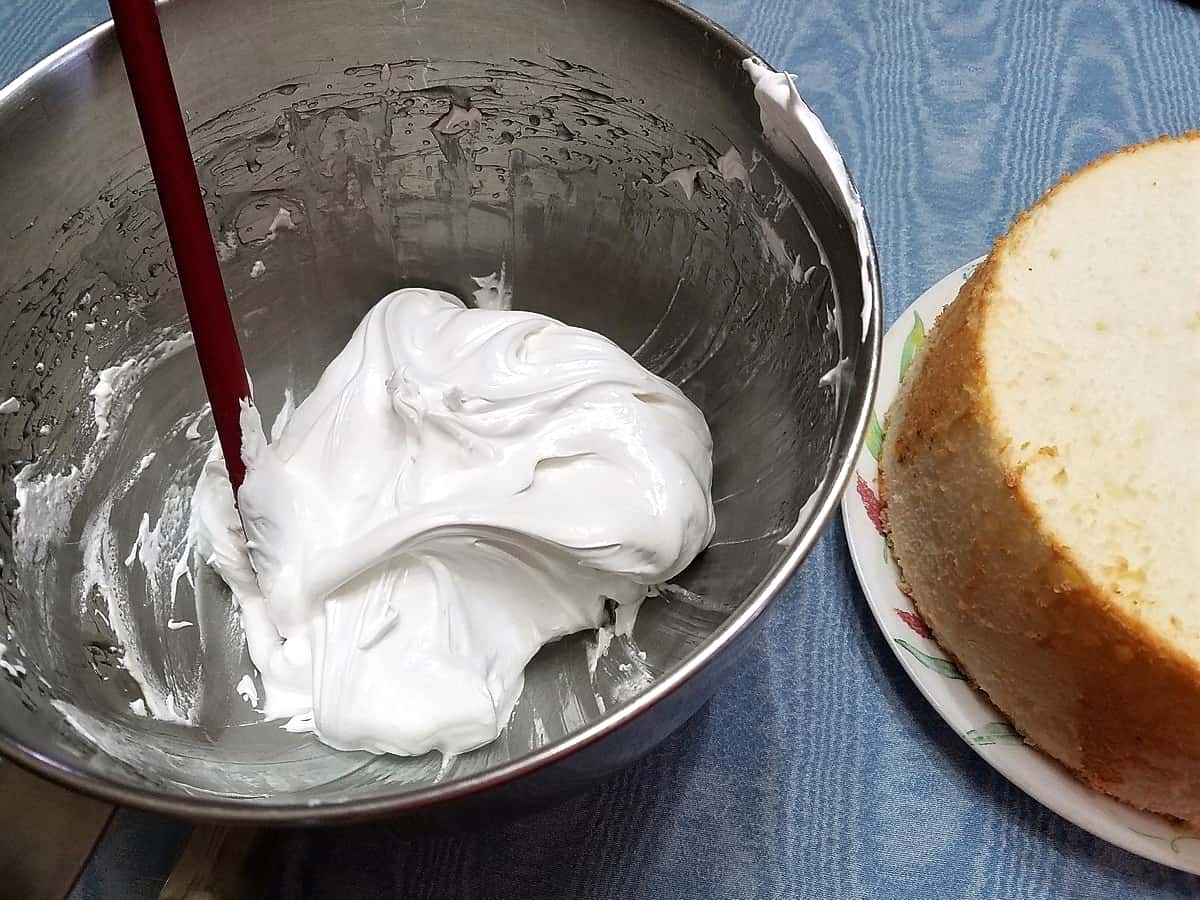 Frosting the Angel Food Cake