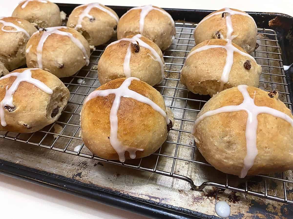 Decorate Slightly Warm Buns with Icing Cross