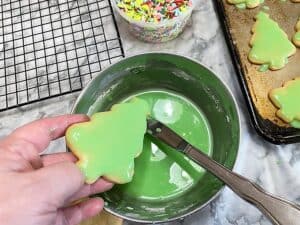 Spread Icing over Baked Cookies