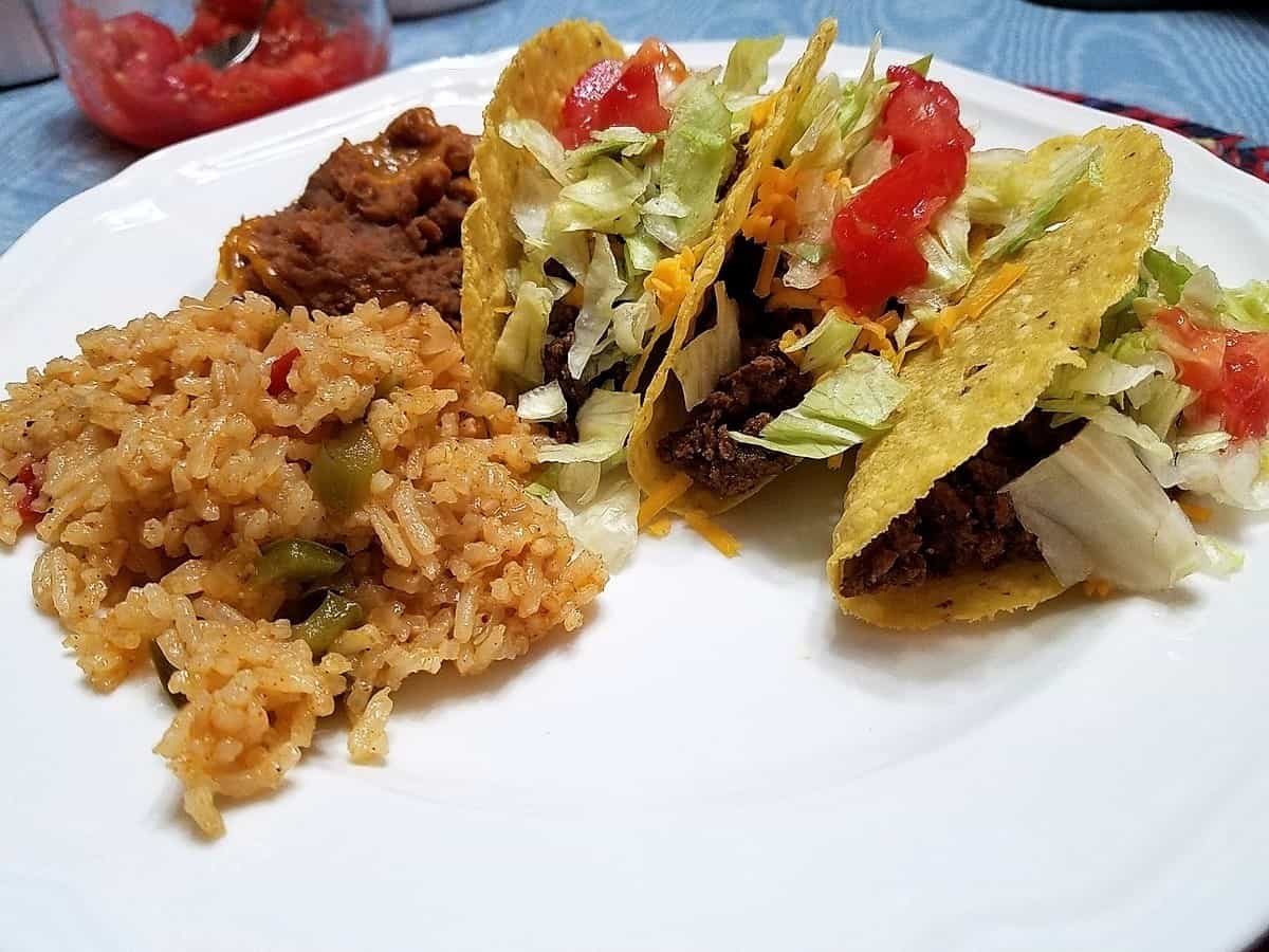 Serving Mexican Rice for a Mexican Night Dinner