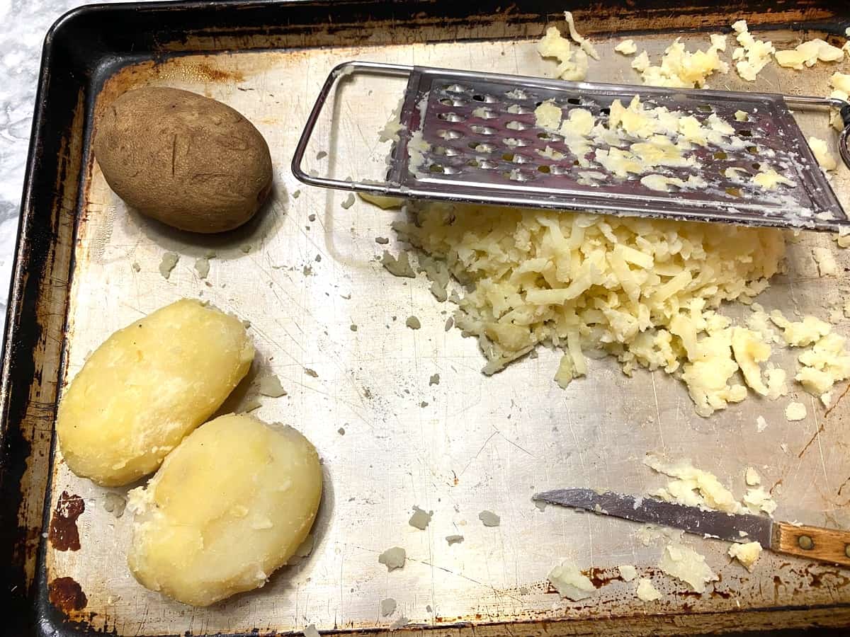 Use a Ricer or Grater to Grate the Hot Baked Potatoes