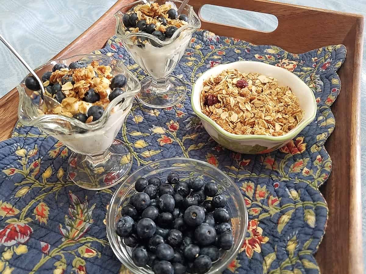 Serving Homemade Granola with Yogurt and Blueberries