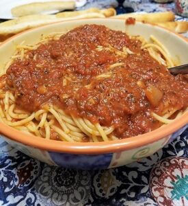 Serve Family-Style with Meatballs in one Dish and Spaghetti and Sauce in another