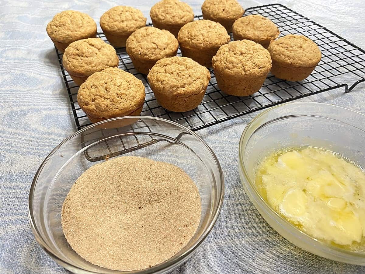 Dipping Muffin Tops in Cinnamon Sugar Mixture