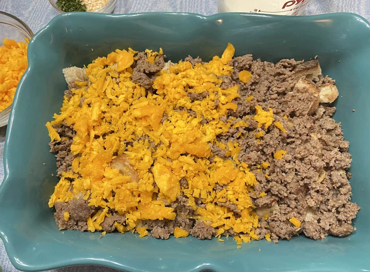 Add Ground Sausage and Grated Cheese