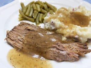 Serving Beef Brisket with Mashed Potatoes and Gravy