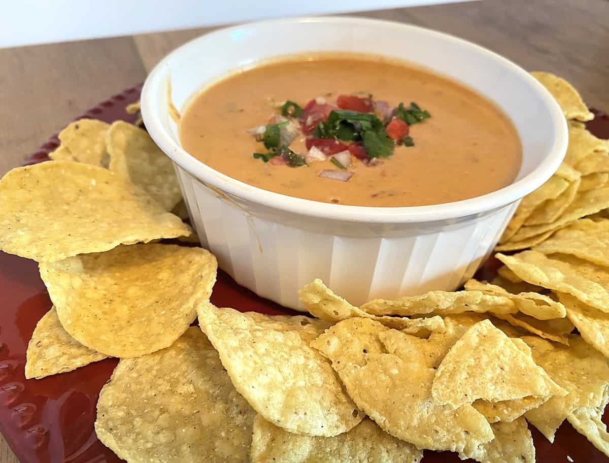 Serving Queso Dip with Chorizo with Corn Tortilla Chips