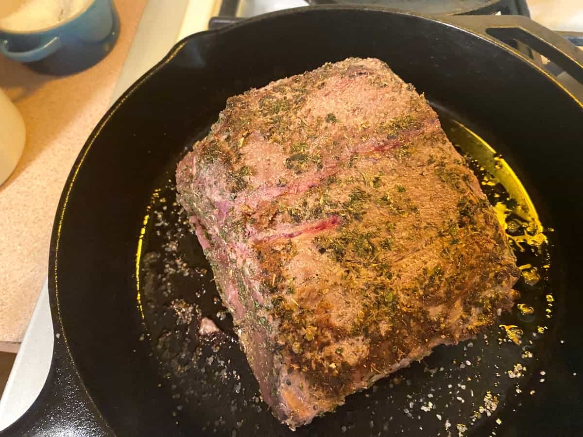 Searing the Roast in a Large Cast Iron Skillet